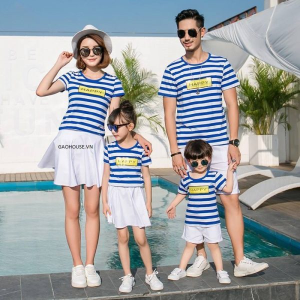 A family posing for a photo Description automatically generated with low confidence
