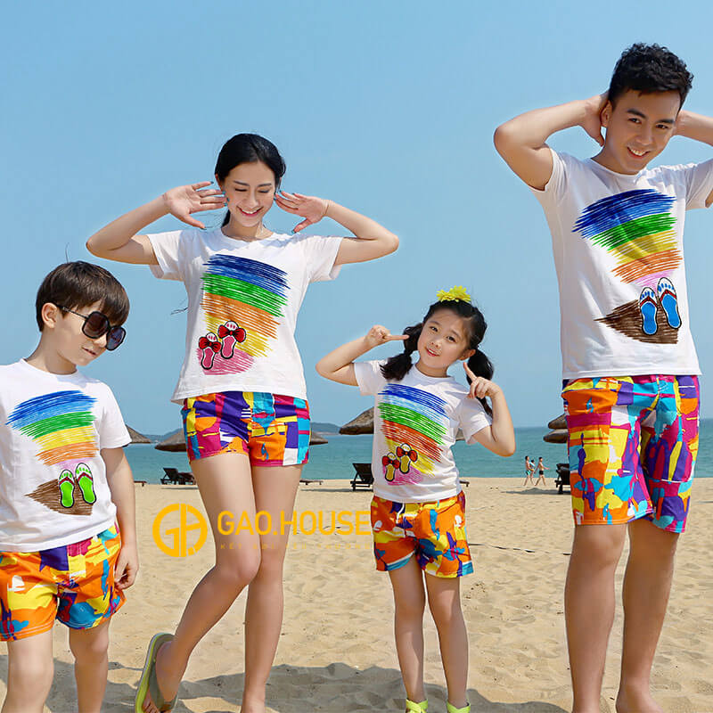 A group of children running on a beachDescription automatically generated with low confidence