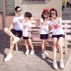 A group of people posing for a photo Description automatically generated with medium confidence