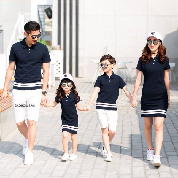 A group of people posing for a photo Description automatically generated