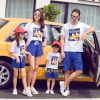 A group of people posing for a picture Description automatically generated with low confidence