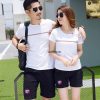 A person and person standing next to each other and holding microphones Description automatically generated with low confidence