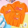A picture containing clothing, orange, romper Description automatically generated