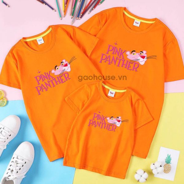 A picture containing clothing, orange, romper Description automatically generated