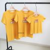 A row of yellow t-shirts Description automatically generated with low confidence