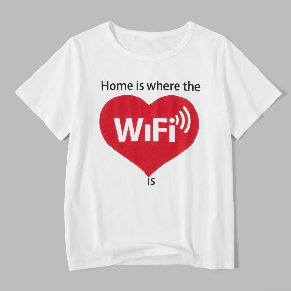 A white t-shirt with a red heart and text on it Description automatically generated with low confidence