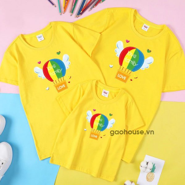 A yellow t-shirt with a logo on it Description automatically generated with low confidence