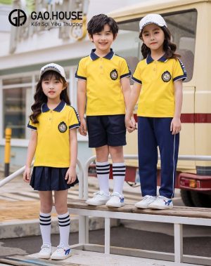 Đồng phục mầm non màu vàng cổ lé đen trắng