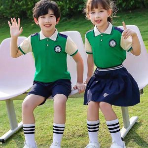 Áo đồng phục mầm non xanh lá cây phối trắng