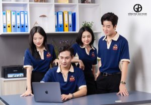 Đồng phục công ty màu tím than phối sườn màu be