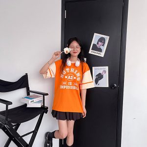 Áo lớp cổ tròn tone be phối cam nổi bật